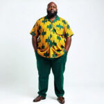 Model wearing Chi & Stainless tailored menswear in Ankara and cotton
