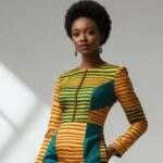 Model wearing Wanderess Ankara dress representing diaspora womanhood
